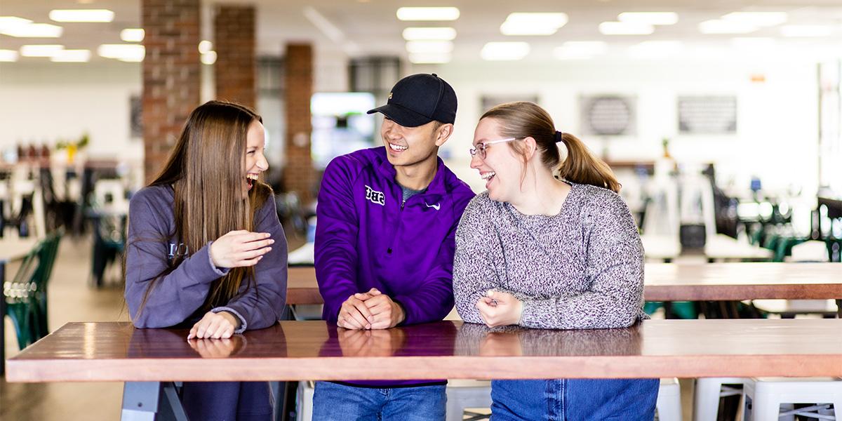 students at the Marketplace talking