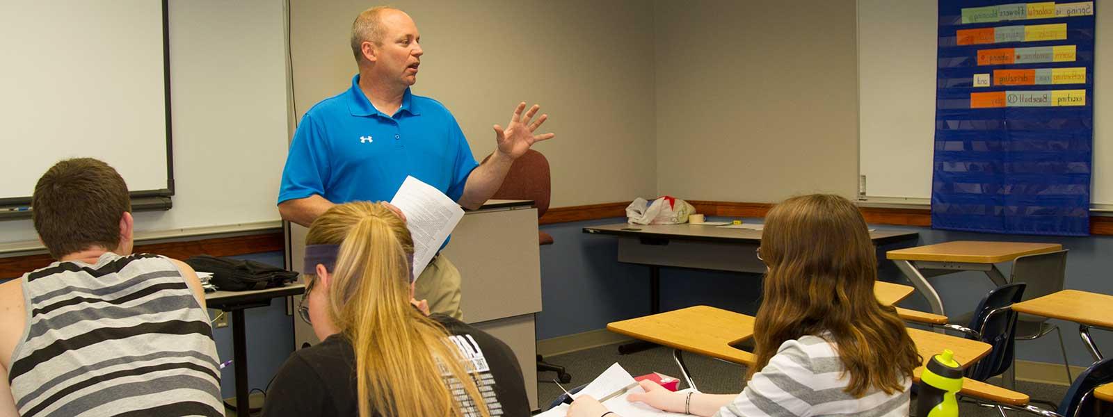 education professor gives class lecture